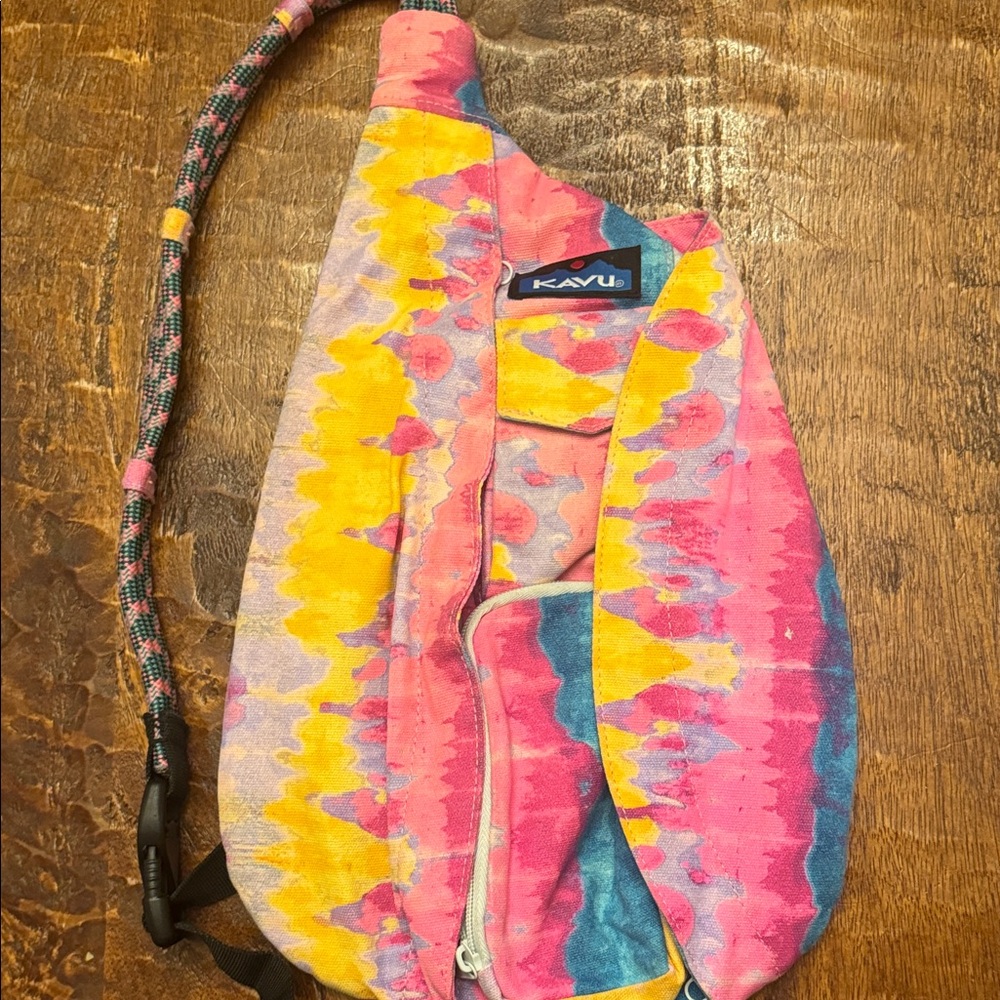 Kavu Tie-Dye Sling Backpack in Pink, Yellow, Blue